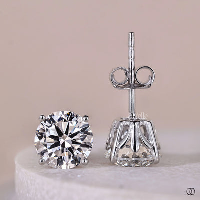 unique earrings round diamond white gold design
