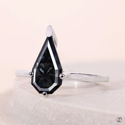 5 prong setting shield cut diamond ring
