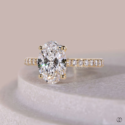 Pavé engagement ring with delicate diamond accents
