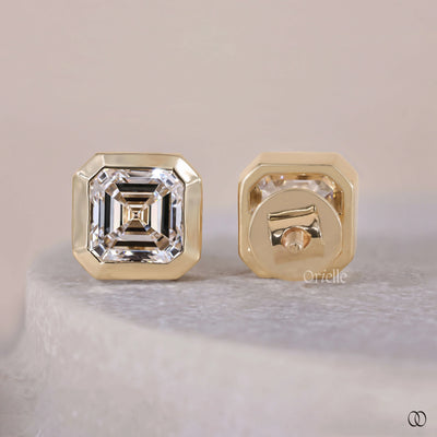 stud earrings for women bezel diamond design
