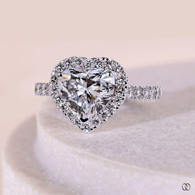 Halo setting engagement ring with a sparkling center stone
