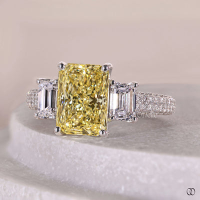 triple row pave band radiant diamond ring
