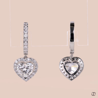 White gold earrings with elegant heart shaped diamond drops
