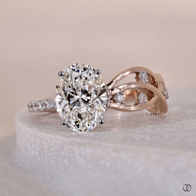 hidden halo ring oval diamond engagement ring
