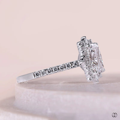 Four prong setting ring with a classic diamond center stone
