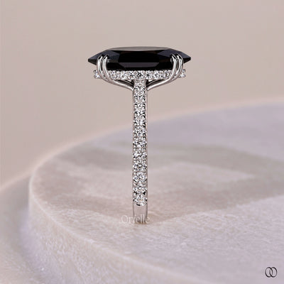 Double claw prong ring with a secure center stone setting
