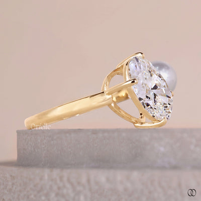 prong setting ring oval diamond pearl ring
