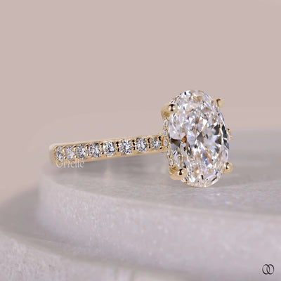 Yellow gold engagement ring with elegant diamond details
