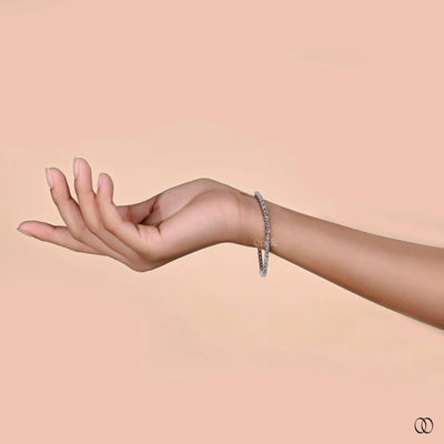 shared prong bracelet oval cut diamond design

