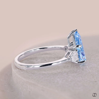 Three stone engagement ring with pear cut diamonds
