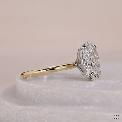 claw prong oval diamond engagement ring
