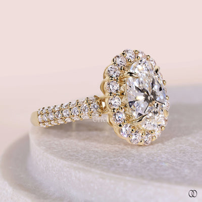 Yellow gold engagement ring with elegant diamond accents
