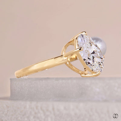 prong setting ring oval diamond pearl ring
