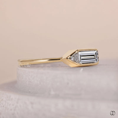 bezel set engagement ring trilliant diamond

