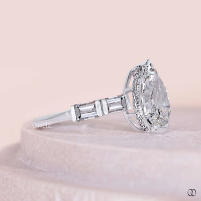 round diamond ring baguette accent design
