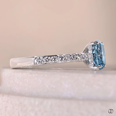 pave ring blue diamond engagement setting
