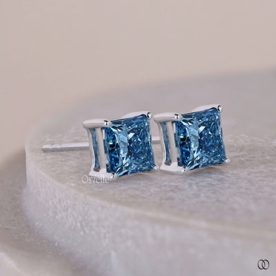 4 prong setting earrings with secure diamond settings and timeless appeal
