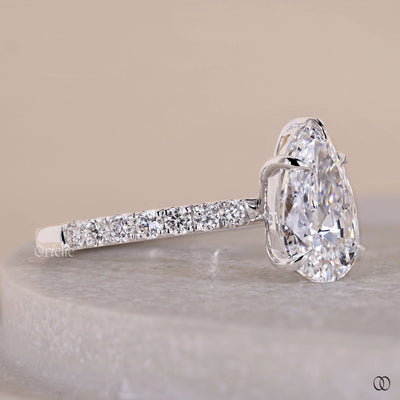 Unique Pave Style Pear Shaped Diamond Engagement Ring
