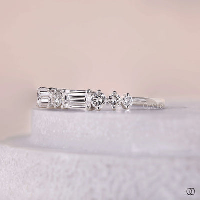 round diamond wedding band prong set design
