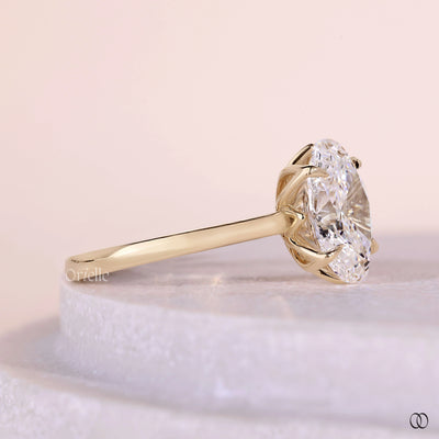 Yellow gold engagement ring with elegant diamond accents