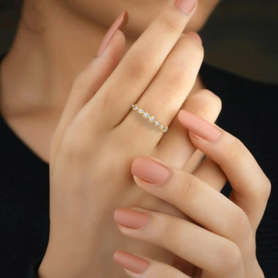 designer pear diamond shared prong wedding band
