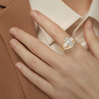 unique design bridal set featuring oval center and curved band
