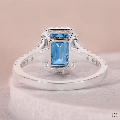 prong setting ring emerald cut halo design
