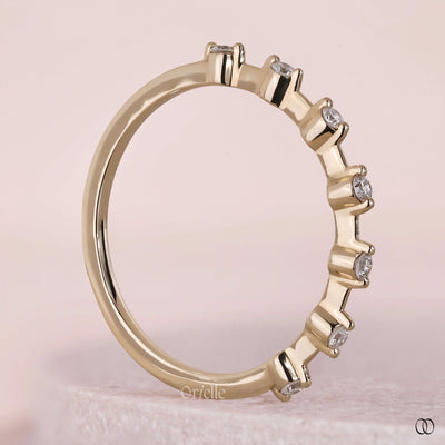 Yellow gold band with elegant diamond detailing
