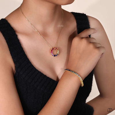 pave style pendant with rainbow gemstones
