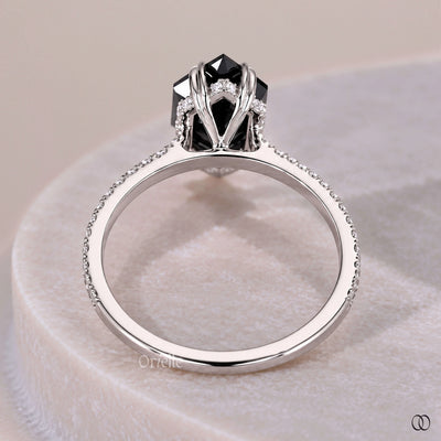 Cathedral engagement ring with an elegant raised design
