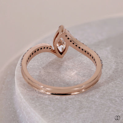 Bezel set engagement ring with a sleek design and brilliant center stone
