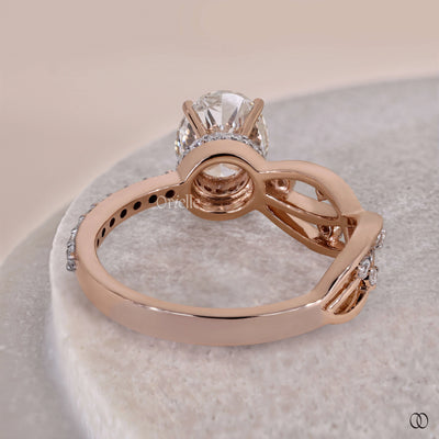 left shoulder pave band oval diamond ring
