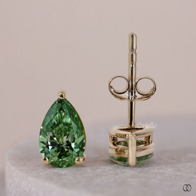 Yellow gold earrings with elegant diamond accents and a polished finish
