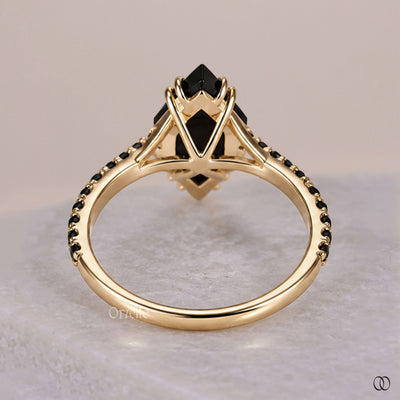 Hidden halo engagement ring with sparkling accent stones  
