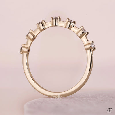 Stacking band with an engagement ring for a layered look
