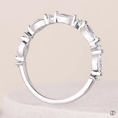 handmade ring marquise and round moissanite band
