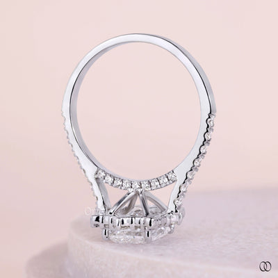 White gold engagement ring with elegant diamond detailing
