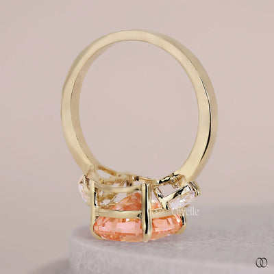 Orange Cushion Cut Ring With Side Trillion Stone