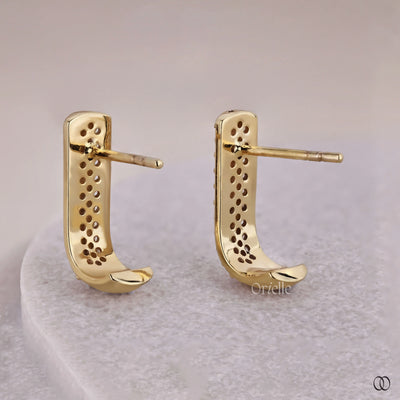 huggie hoop earrings round diamond pave style
