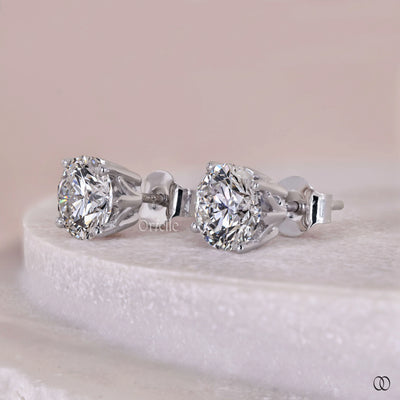 simple earrings round diamond stud setting
