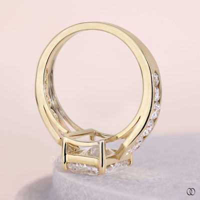 Side stone engagement ring with sparkling accent diamonds
