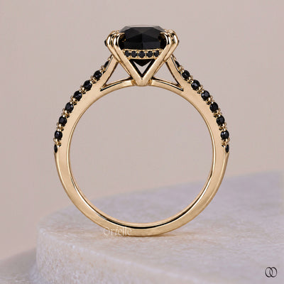 Yellow gold engagement ring with elegant moissanite details  
