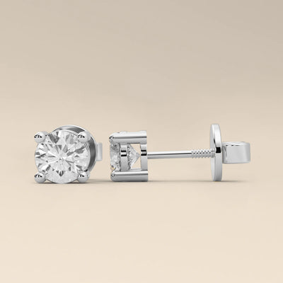 silver earrings round diamond stud solitaire style
