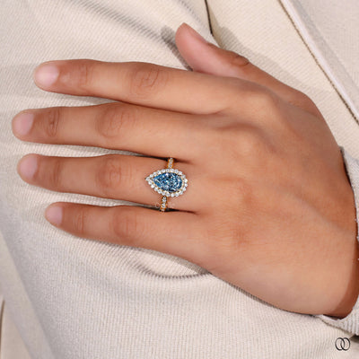 14k yellow gold ring pear diamond setting
