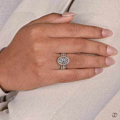 4 prong oval diamond halo bridal ring set
