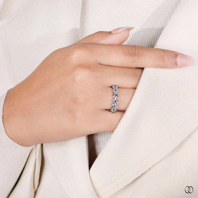 shared prong style white gold eternity band
