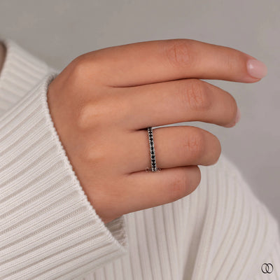 Black moissanite band with a bold and modern design
