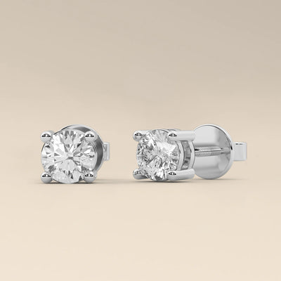 solitaire diamond earrings silver stud design
