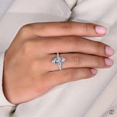 split pave shank ring marquise diamond design
