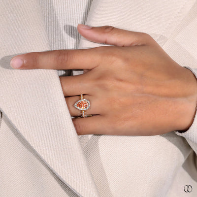 Cathedral setting ring with a raised diamond design
